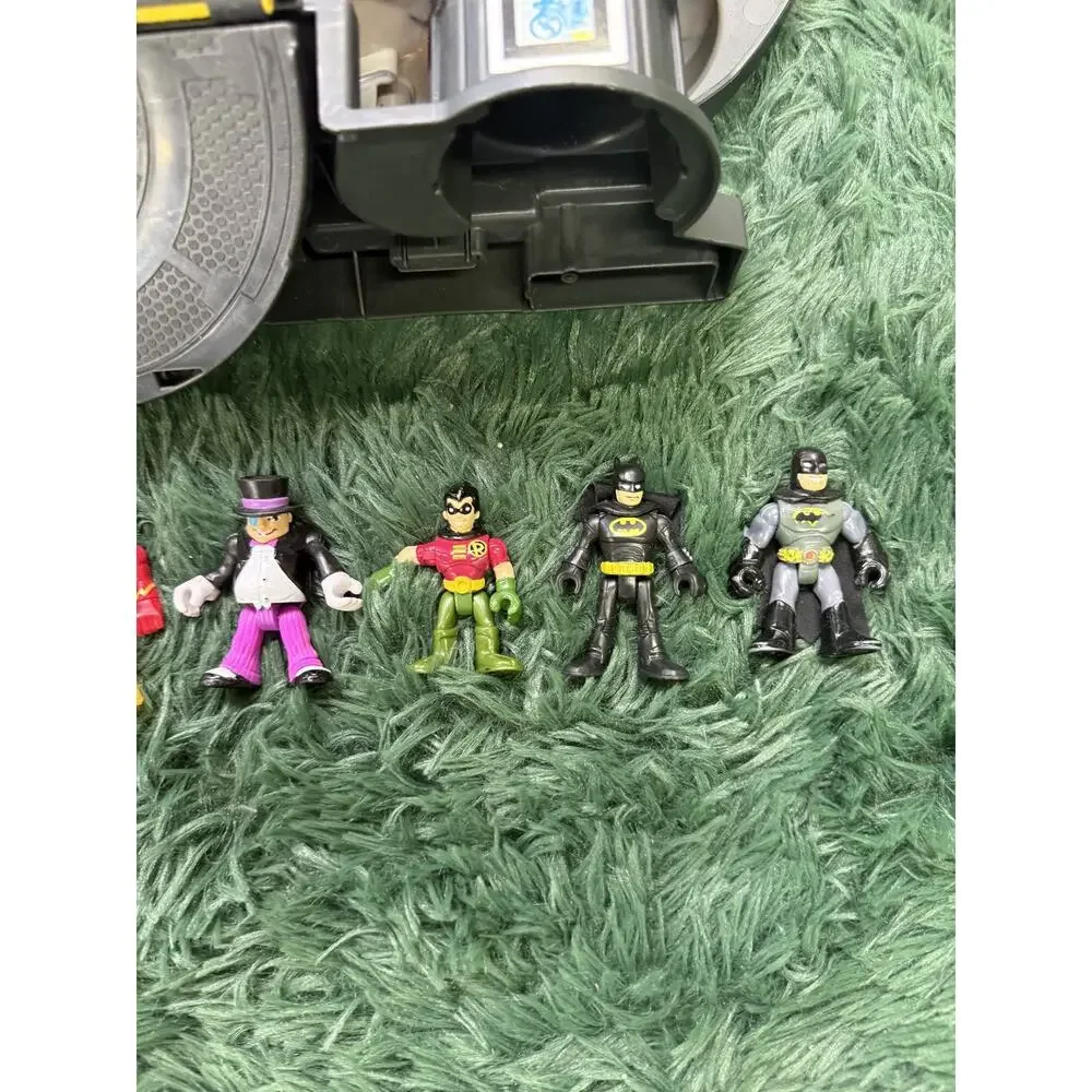 Fisher-Price Imaginext DC Super Friends Batcave Playset & 5 Figures, Penguin Jet